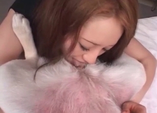 Redheaded beauty bangs a dog